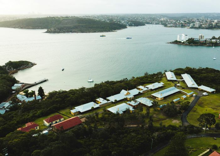 Aerial overlooking Q Station surrounded by North Harbour, Manly