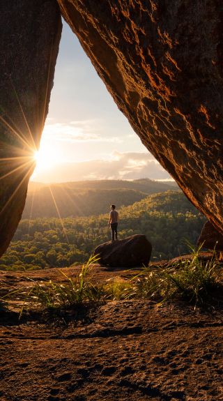 Man enjoying a scenic walk, Dandahra Crags walking track, Gibraltar Range National Park, Gibraltar Range